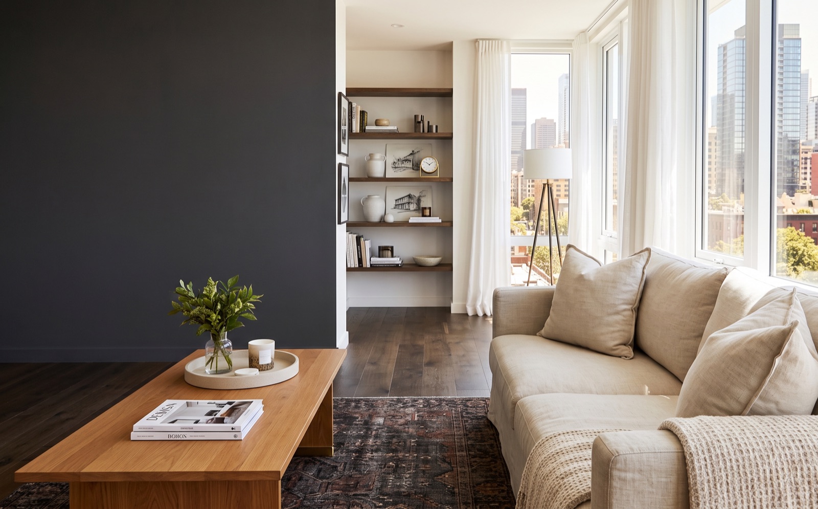 A styled short-term rental living room, freshly cleaned and guest-ready